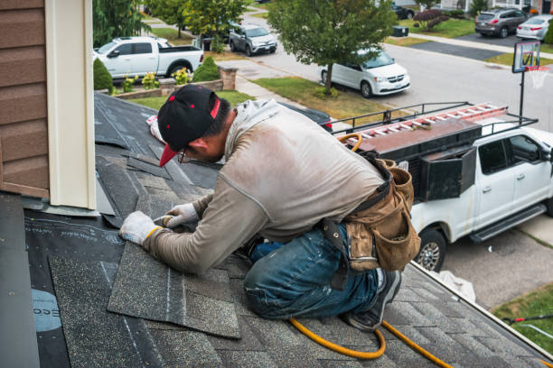 Professional Roofing technician working in Glenford, NY